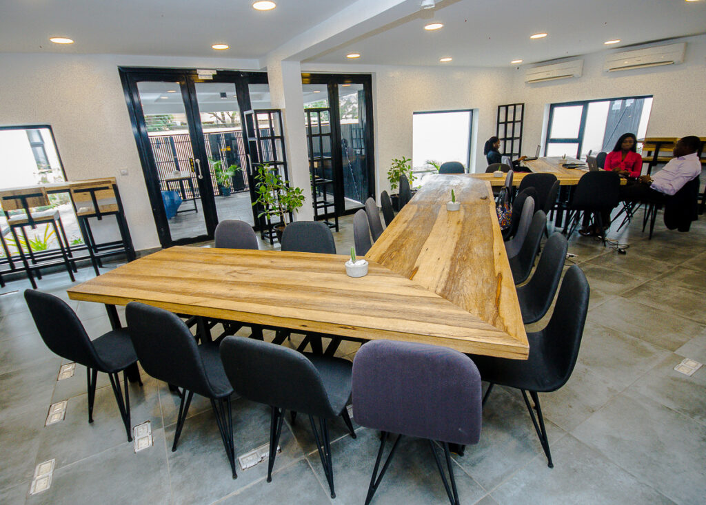 People sitting on chairs in a working space